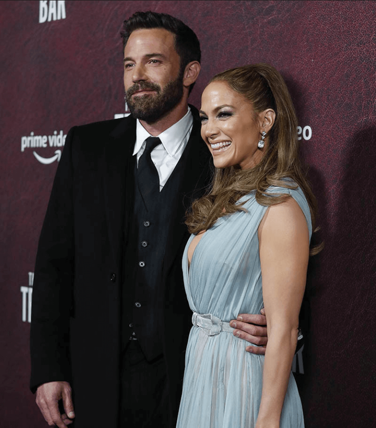 Ben Affleck debuts at the premiere of The Tender Bar sweetly kisses his